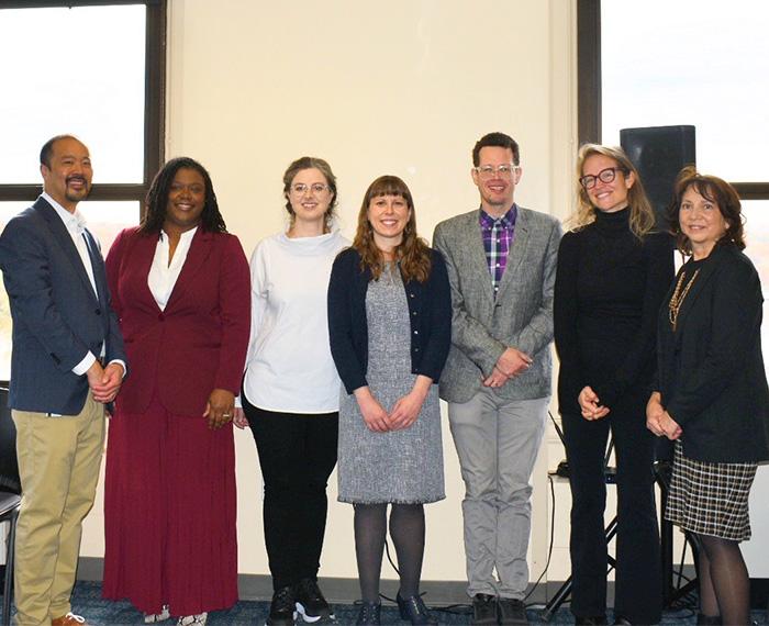 seven awardees standing together