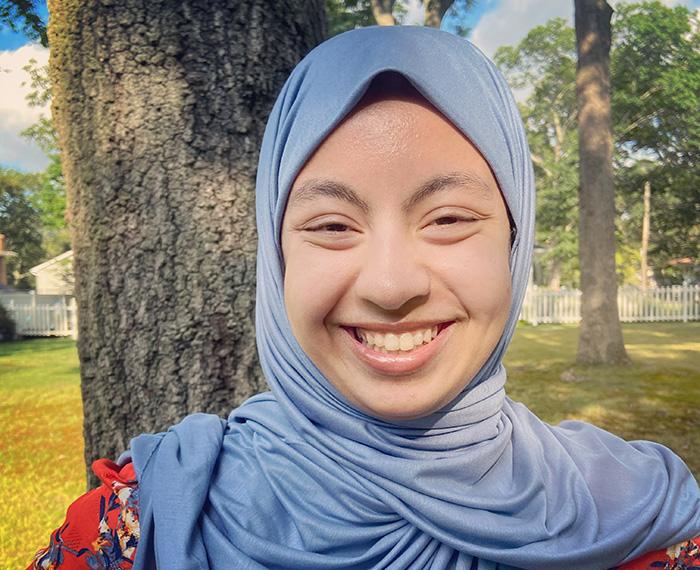 A portrait of Hebah Uddin, who uses the pen name Karuna Riazi