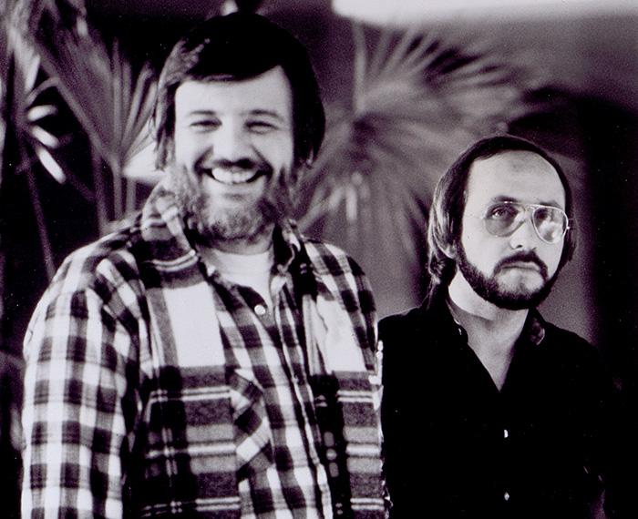 A black and white photo of two men