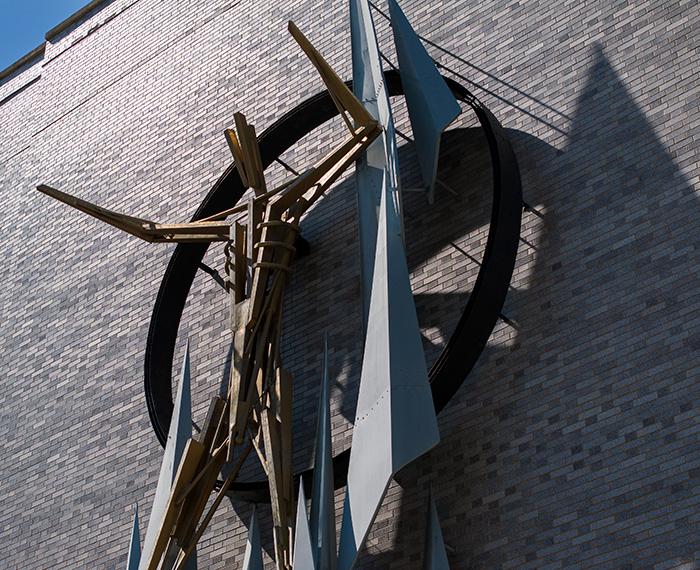 A figure of a man on the side of a building