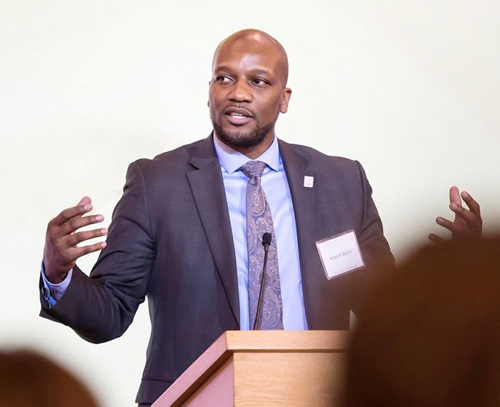 Bonner speaks at a podium