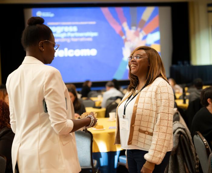 Participants engage with one another during the Community Engaged Scholarship Forum.
