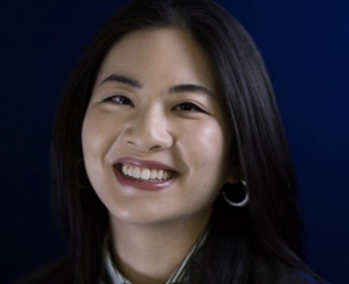 Liu in a suit