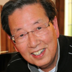 A man in glasses and a black sweater