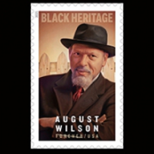 A stamp featuring an oil painting of August Wilson