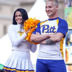 a female and male cheerleader in Pitt gear