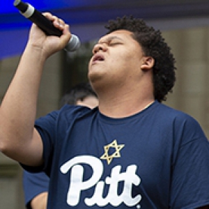 young man holding a microphone