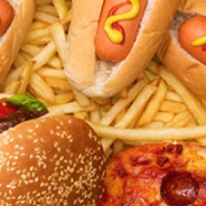 A variety of fast foods, including hamburgers, pizza, hot dogs and French fries