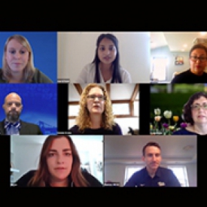 Eight visible participants on a Zoom call