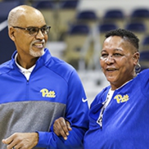 Johnson and her former coach wearing Pitt gear