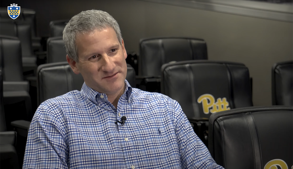 E.J. Borghetti sitting in Pitt auditorium during interview