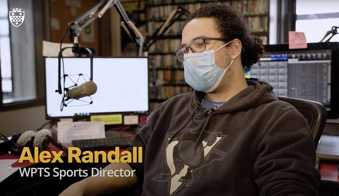 Alex Randall sitting in studio during interview