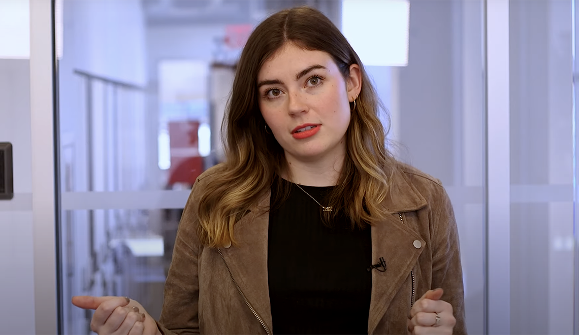 Jess Boddy in brown jacket and black shirt