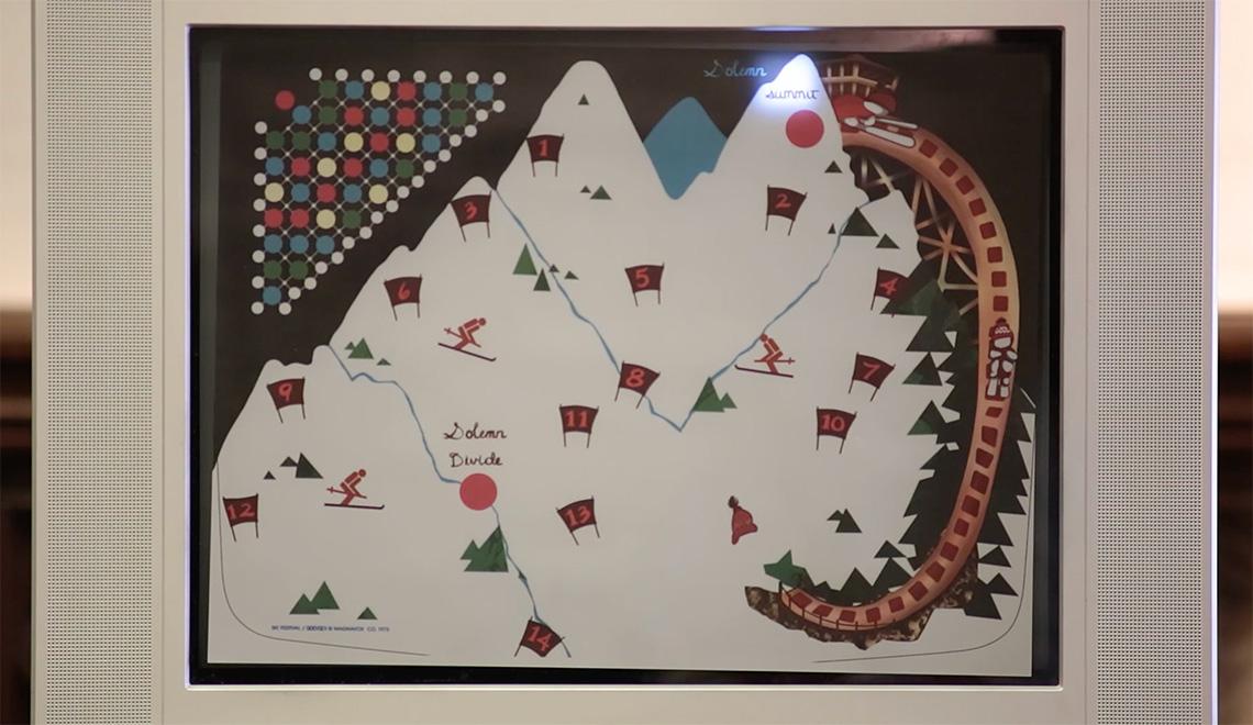 A graphic of a snowy mountain with skiiers